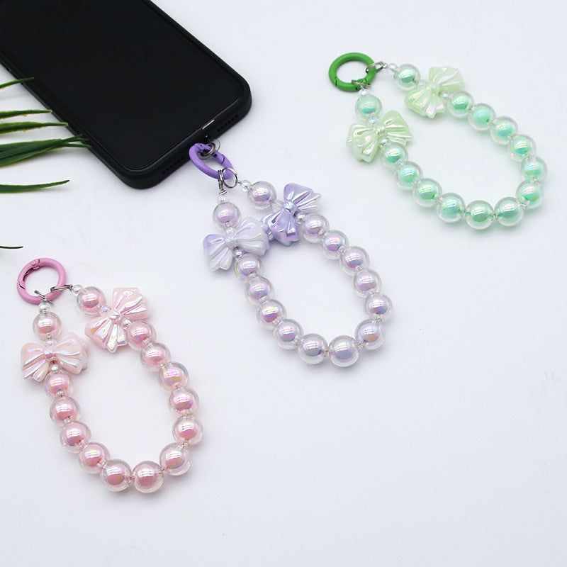 Bowknot bead-in-bead phone chain, handmade beaded single buckle keychain, earphone case pendant, bag accessory bead chain Secondary image