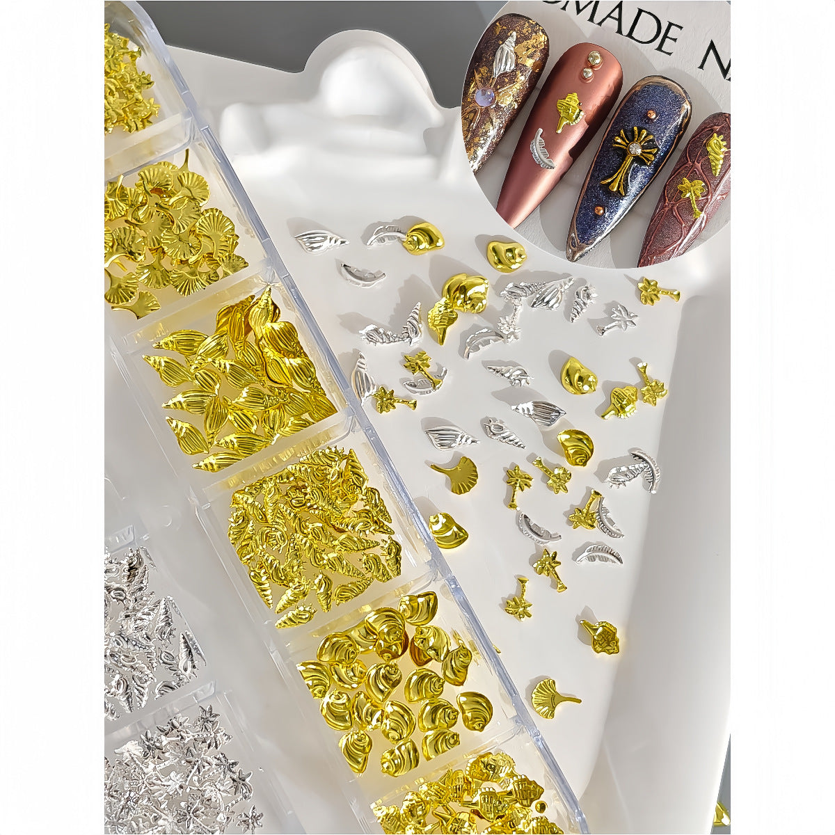 12-piece ocean-themed nail art accessories with various shapes, including gold and silver shells, seahorses, starfish, and metal studs Secondary image